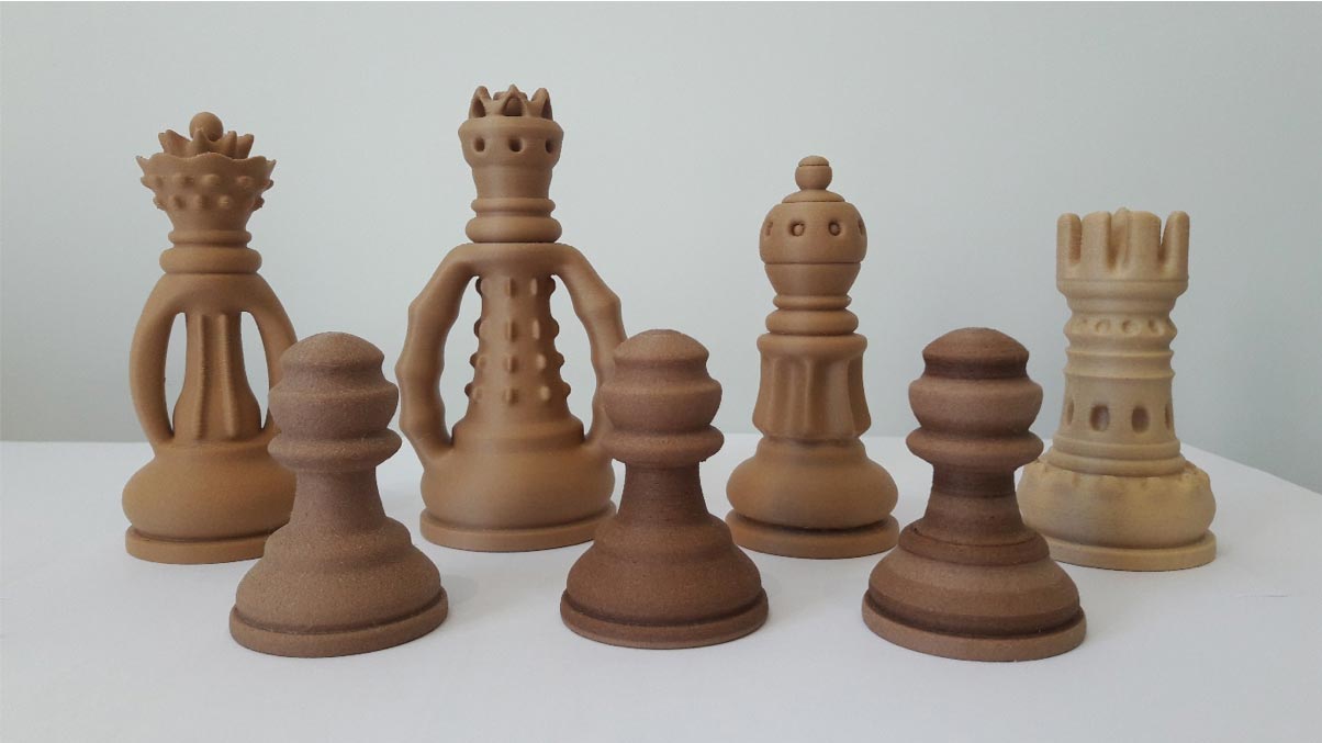Impression en 3D de pièces d'un jeu d'échec et peinture